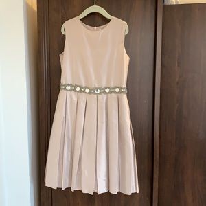 Beautiful silk light pink dress with beaded waist. Size 10. Brand is Fleurisse.